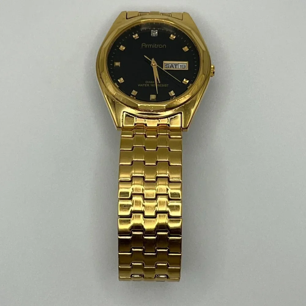 ARMITRON Gold and Black Diamond Mens Watch Working